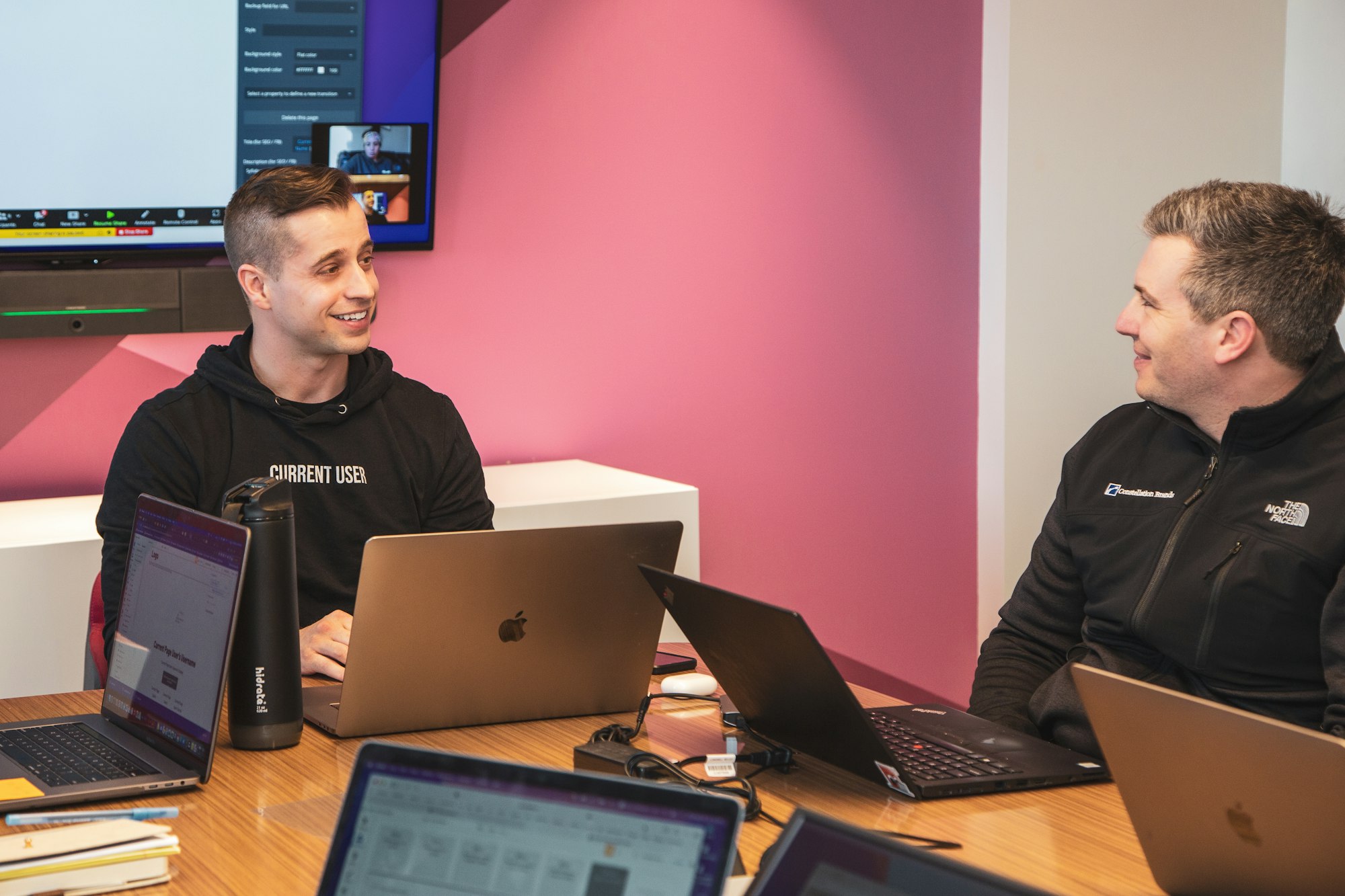 Contact centre team reviewing staffing schedules on a screen