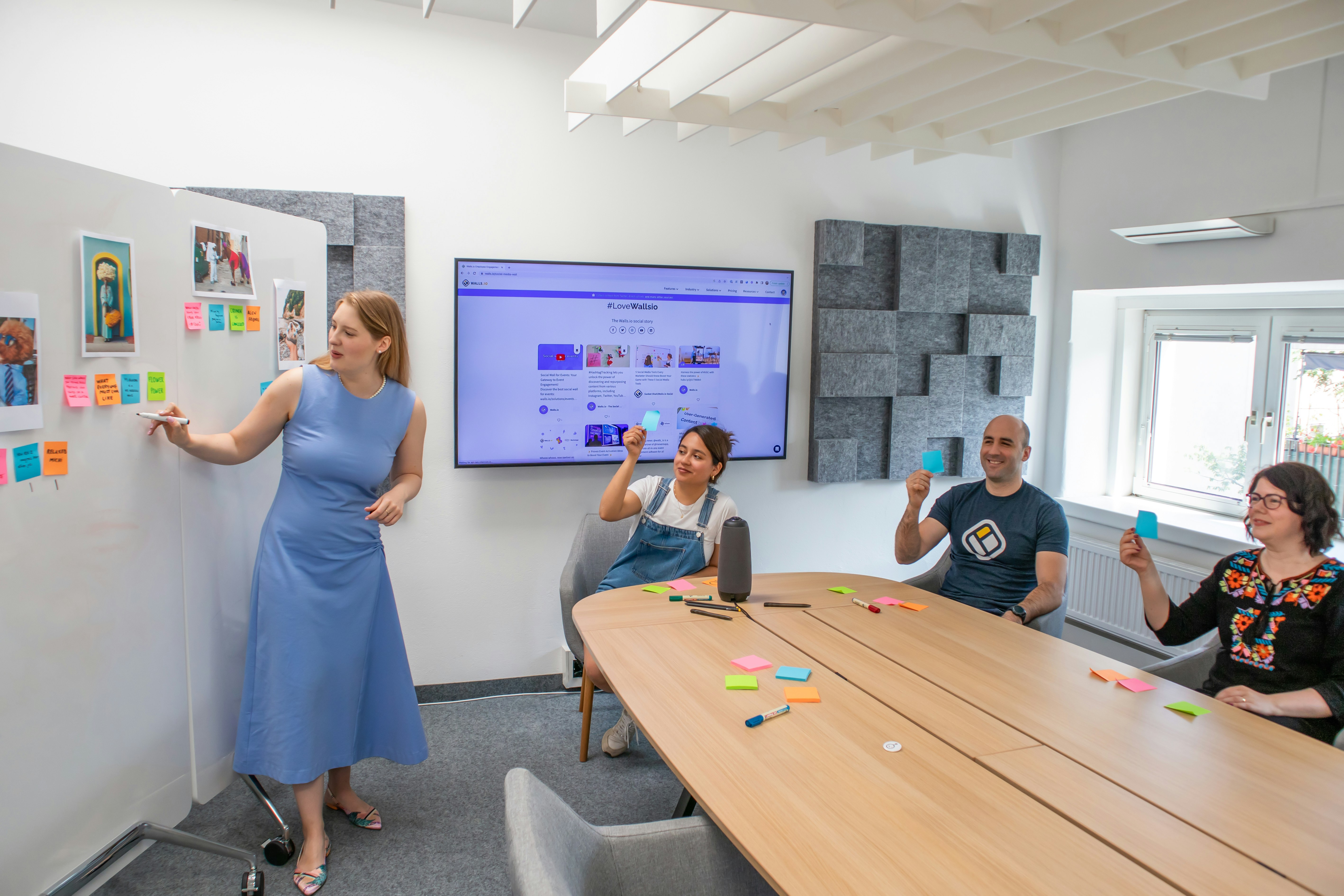 Customer service manager leading a team meeting