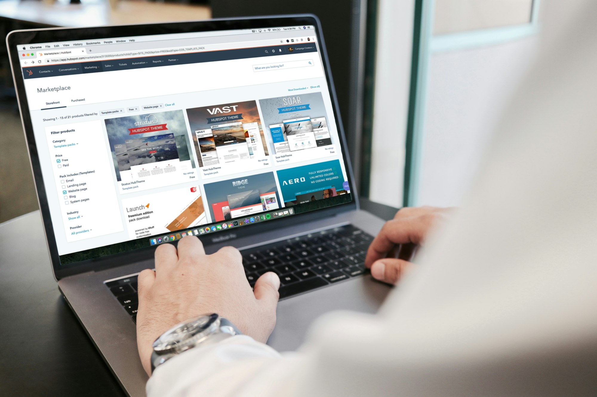 Person viewing an online course certificate on a laptop screen