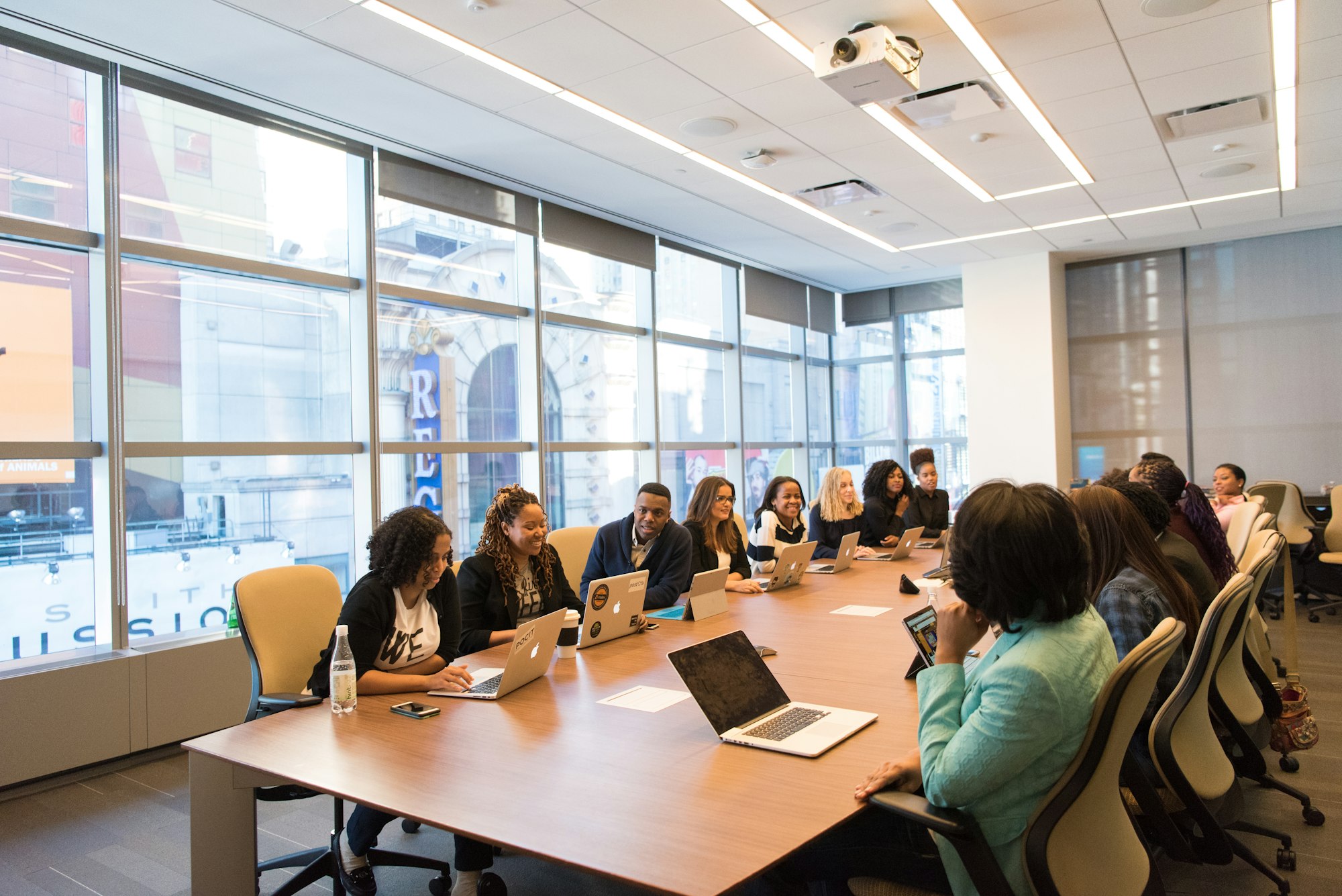 CRM administrator presenting workflow changes in a meeting