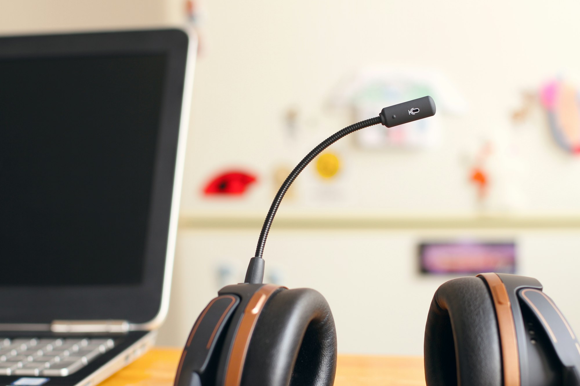 Contact centre professional wearing a headset at a workstation
