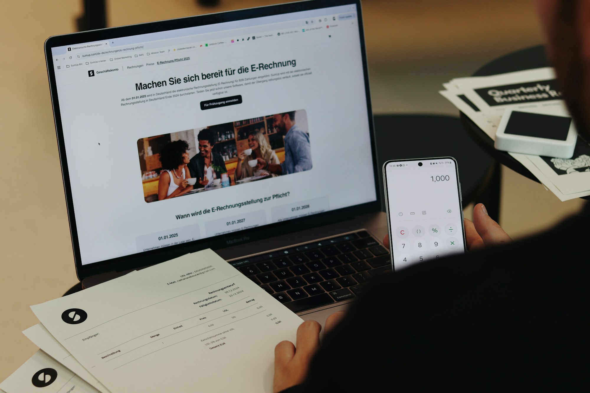 Professional completing an online course on a laptop with notes beside them