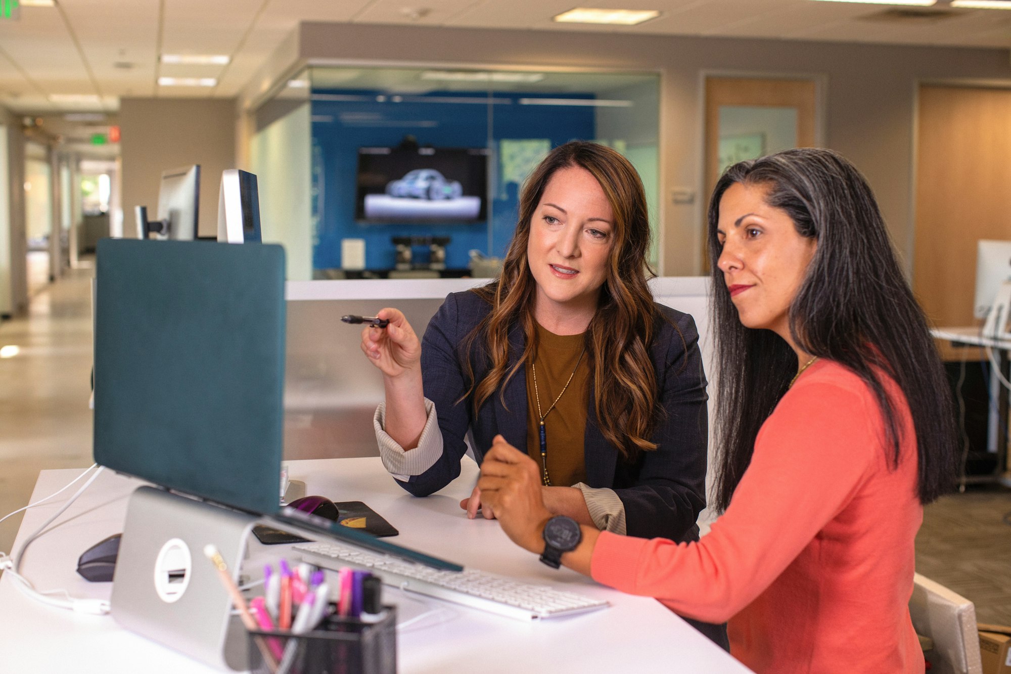 Customer service team in a workplace discussion